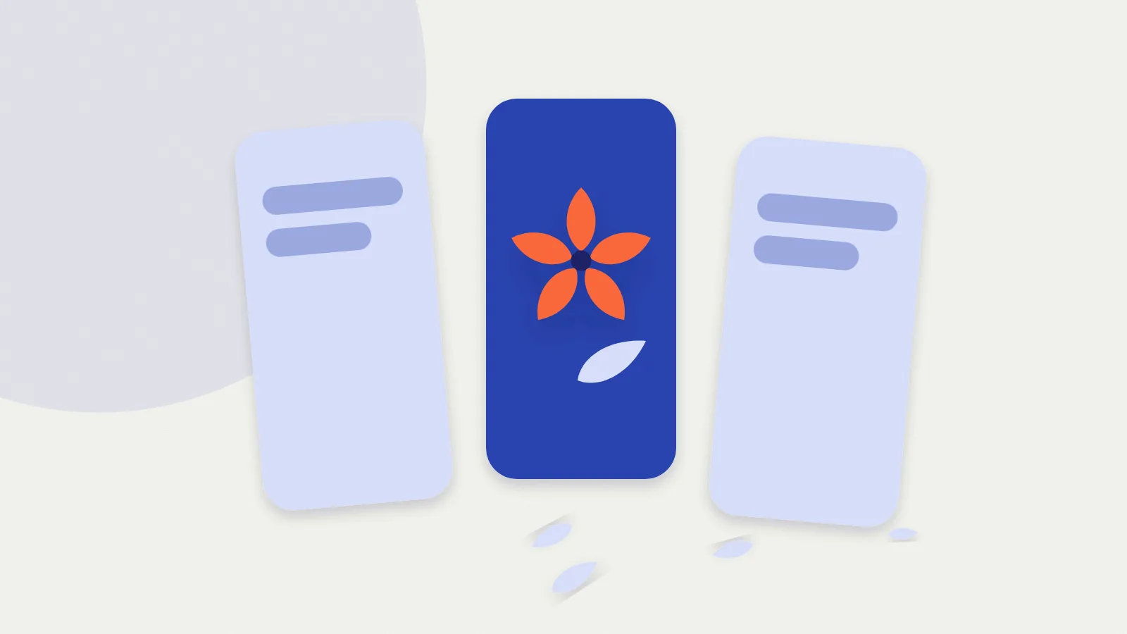 Aus Papier geschnittene Handys nebeneinander, eines mit einer orangefarbenen Blume